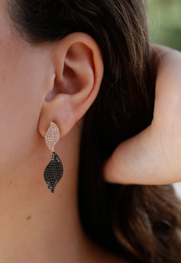 rose gold 18K earrings with black and white diamonds